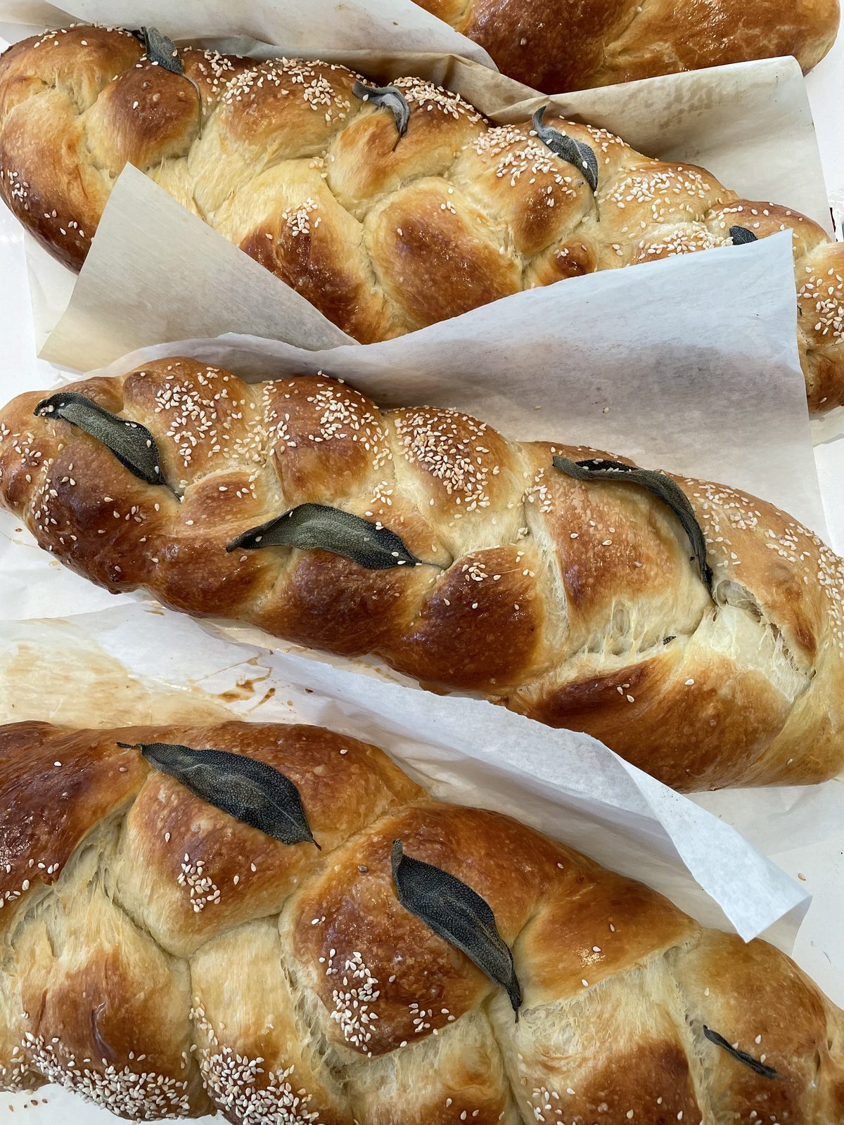 Braided challah with sage and sesame
